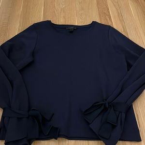 NWOT J Crew sweater with stylish arm wraps. Navy. Never worn.